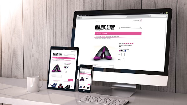 Digital generated devices on desktop, responsive mock-up with online shop website  on screen. All screen graphics are made up.
